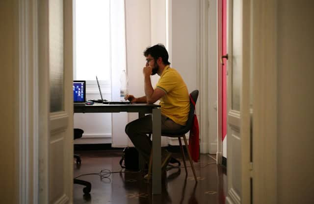 guy working on his computer